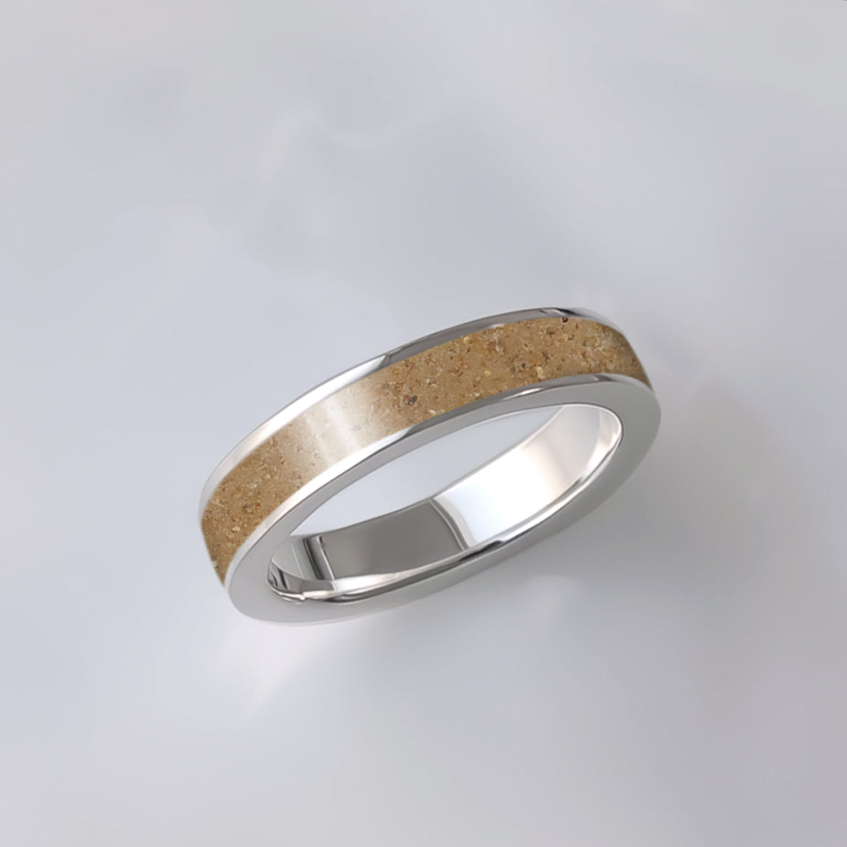 Alianza de plata con arena de playa o tierra.