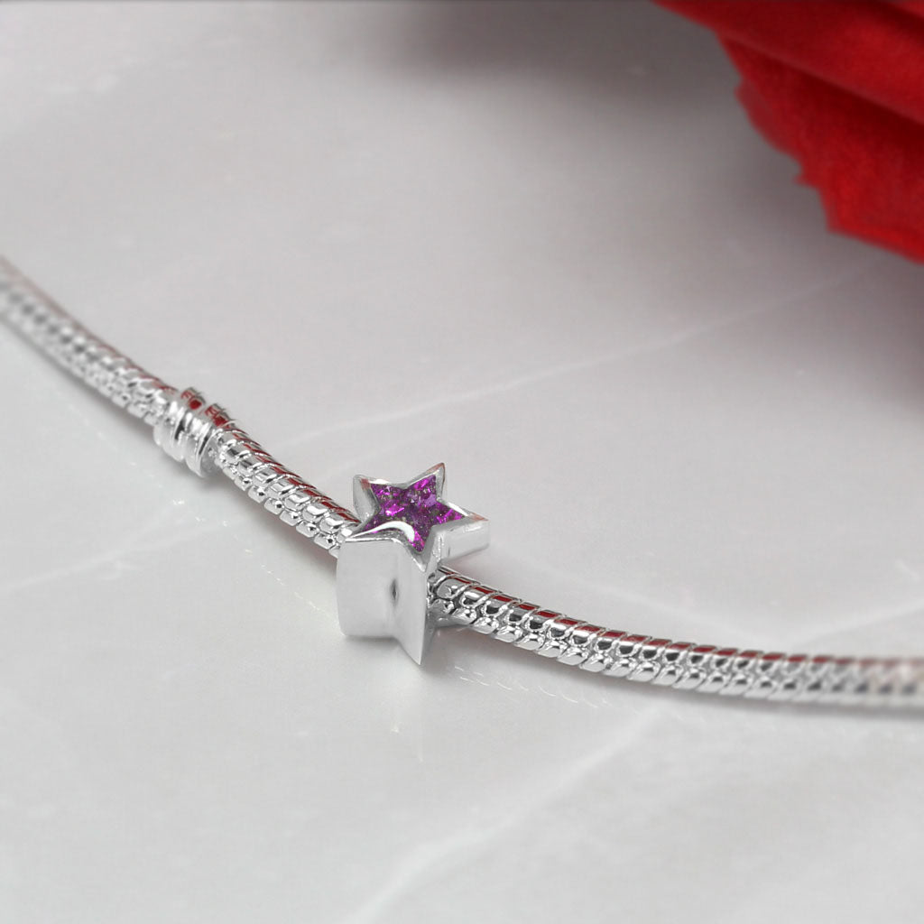 Charm con Cenizas dentro de Estrella de Plata de Lay