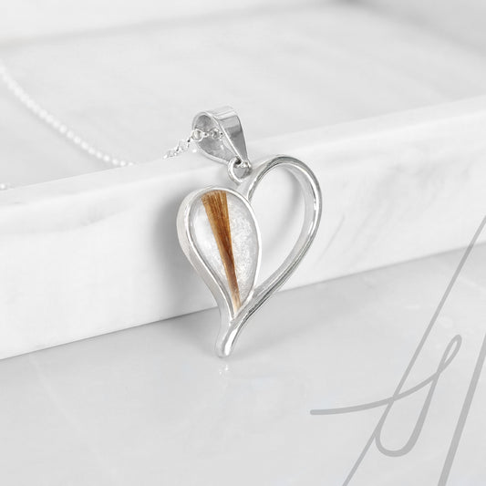 Colgante con Pelo en Corazon Latiendo de Plata