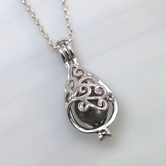 Colgante de plata · Jaula lágrima y perla con cenizas de tu mascota