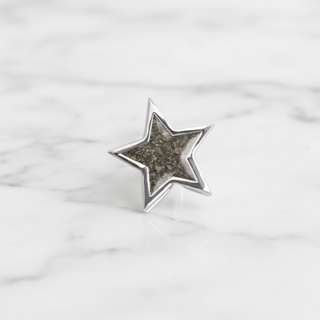 Charm de plata · Estrella de ceniza