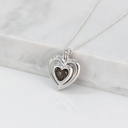 Colgante con Cenizas en Esfera dentro de Corazón de Plata de Ley en forma de Jaula Protectora