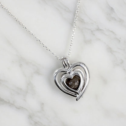 Colgante con Cenizas en Esfera dentro de Jaula Corazón de Plata de Ley