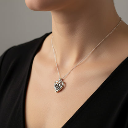 Colgante con Cenizas en Esfera dentro de Jaula Corazón de Plata de Ley