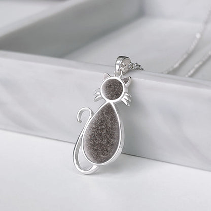 Colgante con silueta de gato con cenizas de mascota.