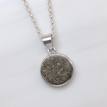 Colgante de plata · Círculo de ceniza