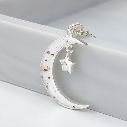 Colgante con cordón umbilical · Luna y estrella con cordón umbilical