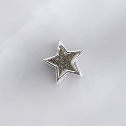 Charm de plata · Estrella de ceniza