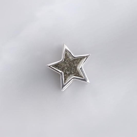 Charm de plata · Estrella de ceniza