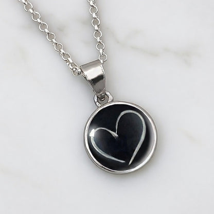 Colgante con Pelo en Diseño dentro de Círculo de Plata