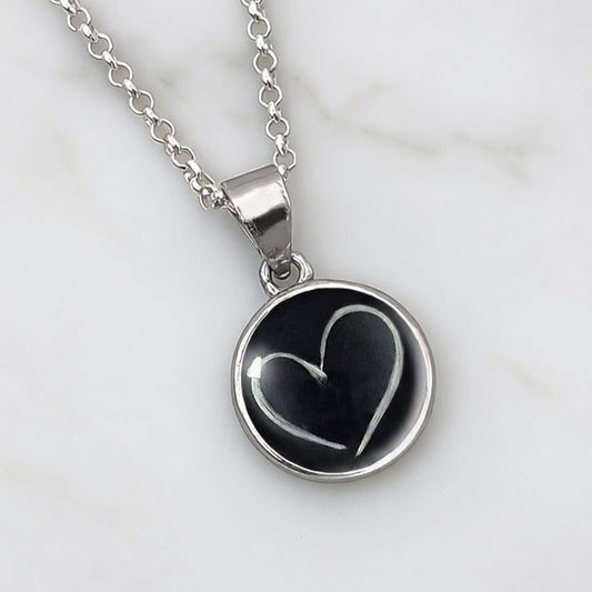 Colgante con Pelo en Diseño dentro de Círculo de Plata